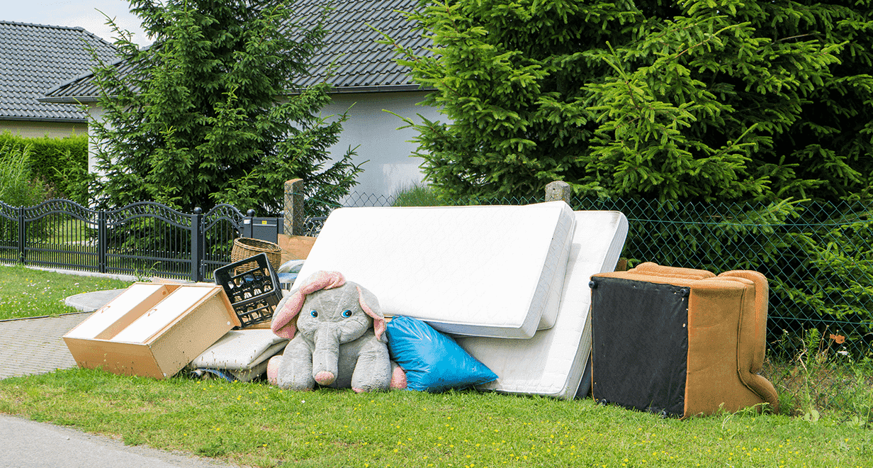 Junk left for pick up in the front yard of someones home